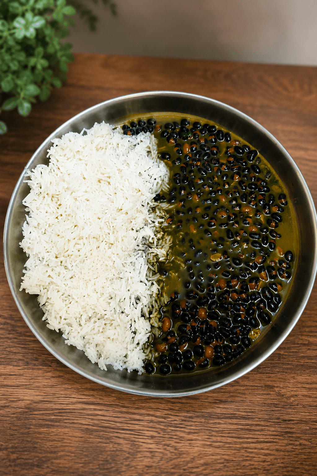 A bowl of Bhatt ki Churkani, a nutty brown gravy of stewed black soybeans, served with rice